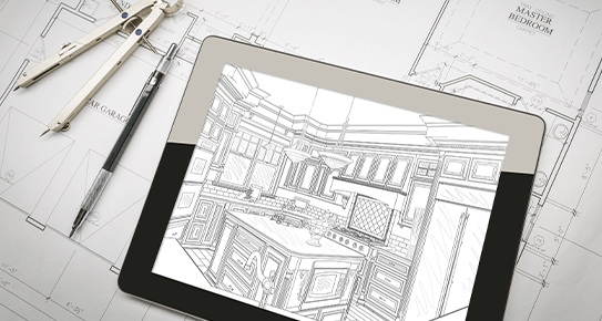 デスクの上に設計図が置かれている写真